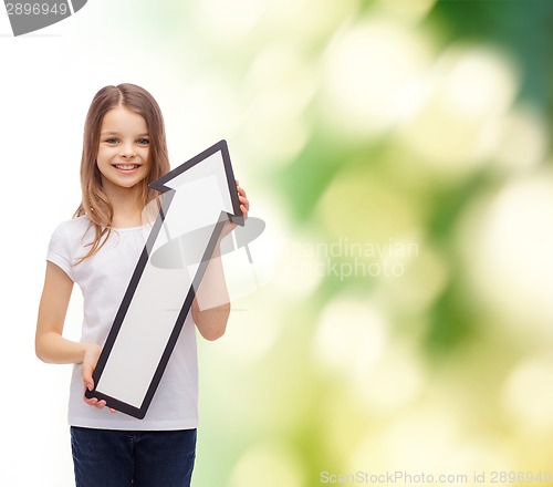 Image of smiling little girl with blank arrow pointing up