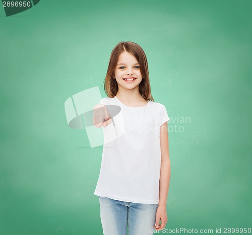 Image of smiling little girl in white blank t-shirt