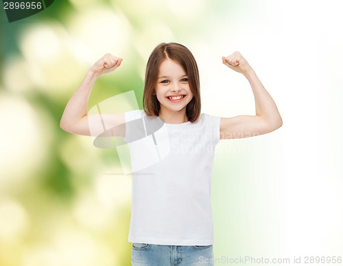 Image of smiling little girl in white blank t-shirt