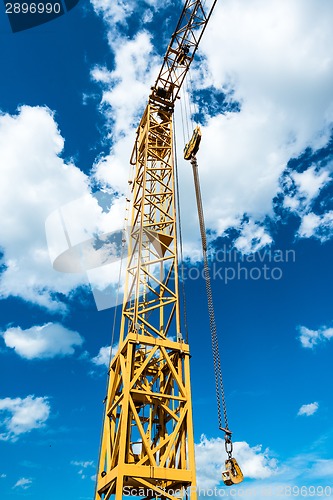 Image of Yellow construction crane detail