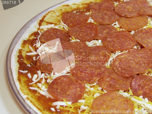 Image of Uncooked Pepperoni Pizza