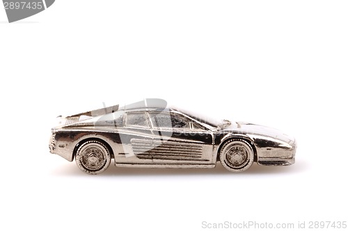 Image of model of sport car in silver metal isolated 