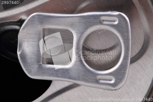 Image of detail of aluminum opener 