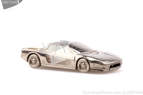 Image of model of sport car in silver metal isolated 