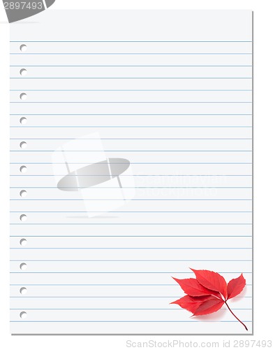 Image of Notebook paper with red autumn virginia creeper leaf in corner