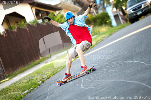 Image of Longboarder Teen