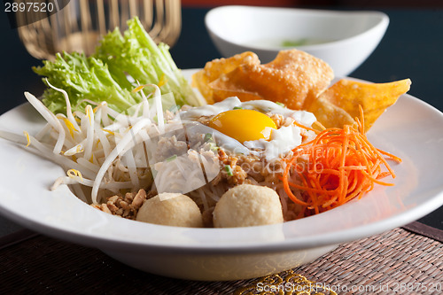 Image of Thai Noodle Dish with Fried Egg