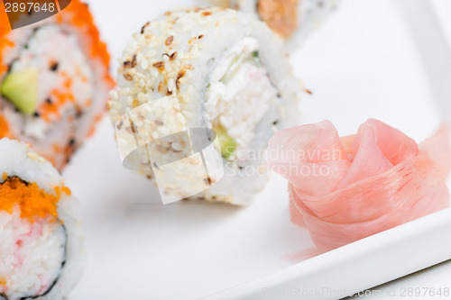 Image of Rose from ginger and sushi rolls