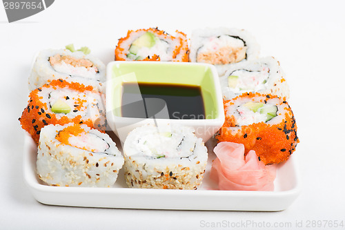 Image of Different sorts of sushi on the plate