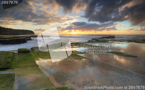 Image of Rising sun on  Turrimetta coastline Sydney