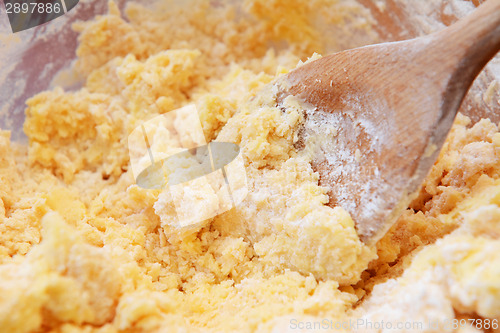Image of Creaming butter and icing sugar together 