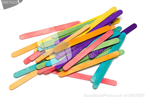 Image of pile of assorted colored craft sticks