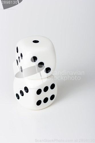 Image of The dice on a white table