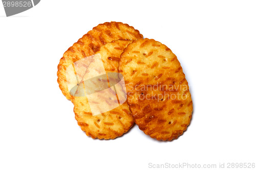 Image of three oval cookies over white