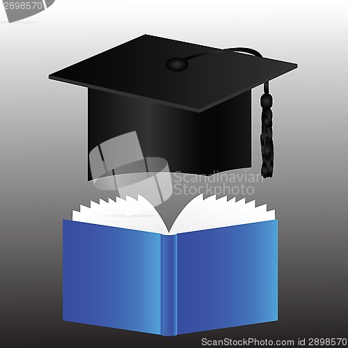 Image of graduation cap and book