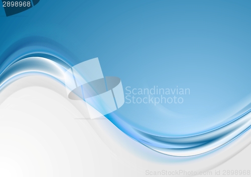 Image of Bright blue wavy abstract background