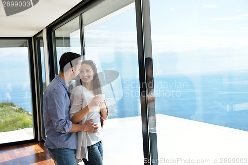 Image of relaxed young couple at home