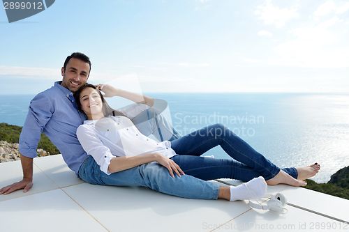Image of relaxed young couple at home