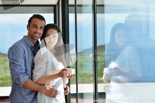 Image of relaxed young couple at home