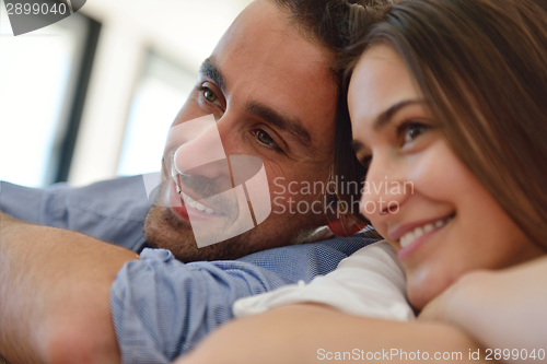 Image of relaxed young couple at home