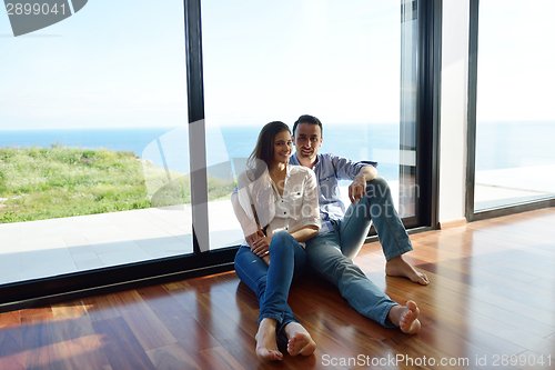 Image of relaxed young couple at home