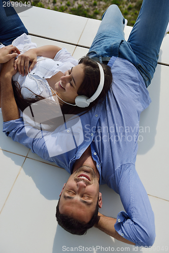 Image of relaxed young couple at home