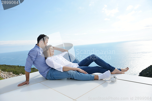 Image of relaxed young couple at home