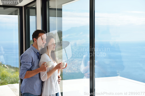 Image of relaxed young couple at home