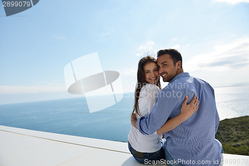 Image of relaxed young couple at home