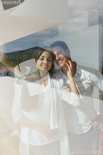 Image of relaxed young couple at home