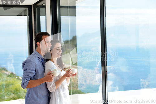 Image of relaxed young couple at home