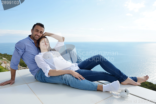 Image of relaxed young couple at home