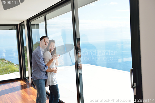 Image of relaxed young couple at home