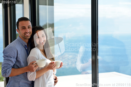 Image of relaxed young couple at home