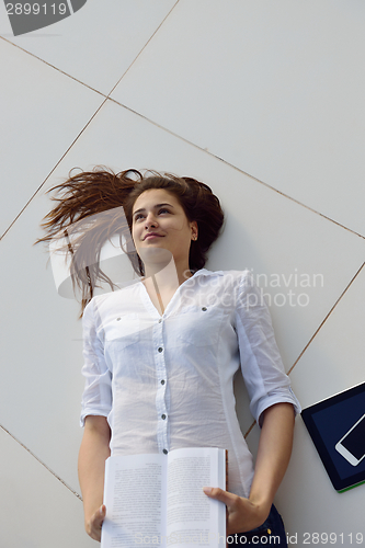 Image of relaxed young womant at home