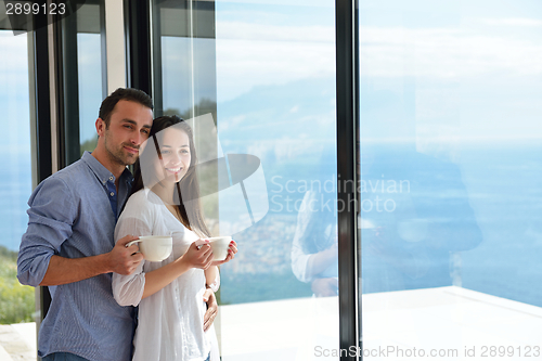 Image of relaxed young couple at home