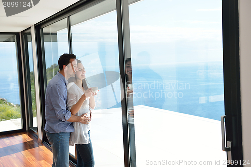 Image of relaxed young couple at home