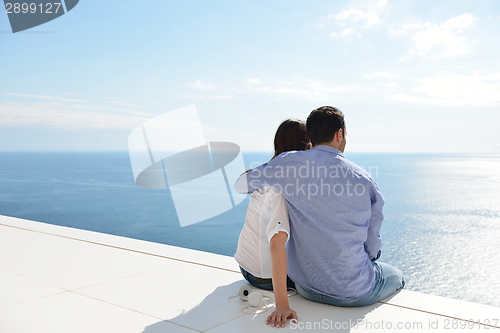 Image of relaxed young couple at home