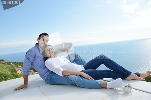 Image of relaxed young couple at home