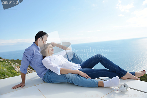 Image of relaxed young couple at home