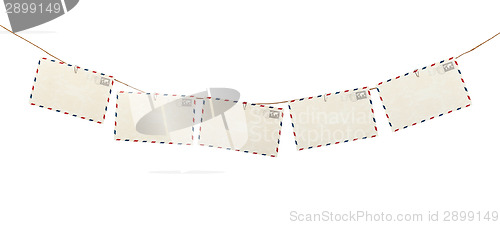 Image of Post cards hanging on a rope