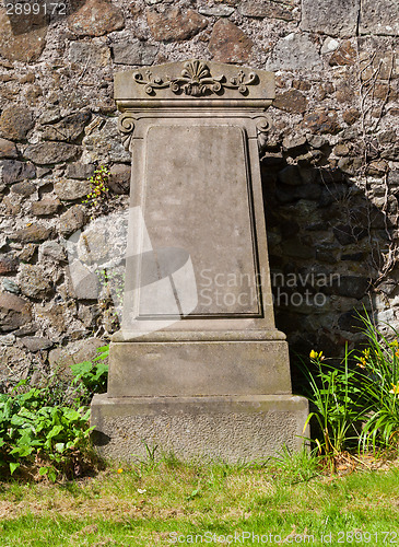 Image of Very old gravestone on a cemetery