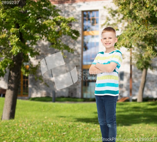 Image of smiling little boy in casual clothes