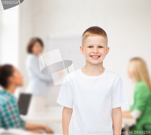 Image of smiling little boy in white blank t-shirt