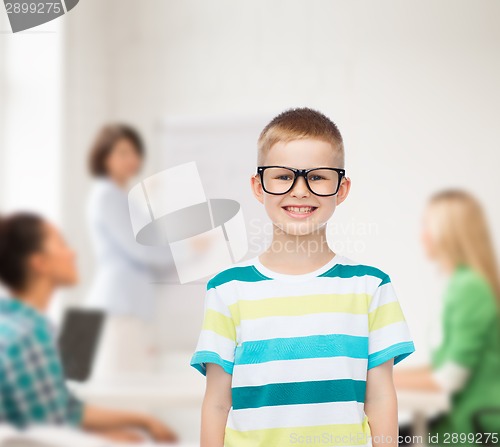 Image of smiling little boy in eyeglasses