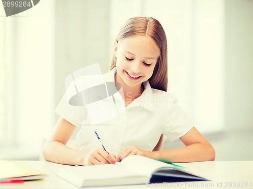 Image of student girl studying at school