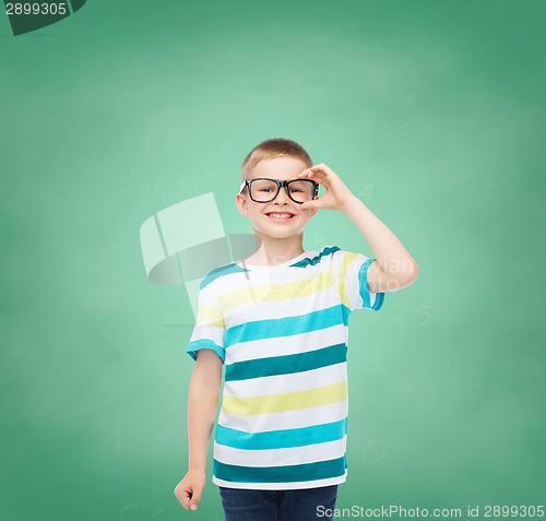 Image of smiling little boy in eyeglasses