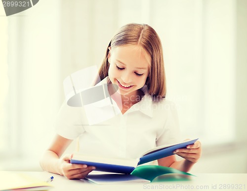 Image of student girl studying at school