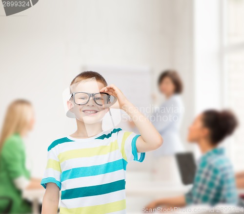 Image of smiling little boy in eyeglasses
