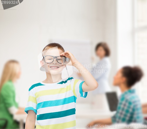 Image of smiling little boy in eyeglasses